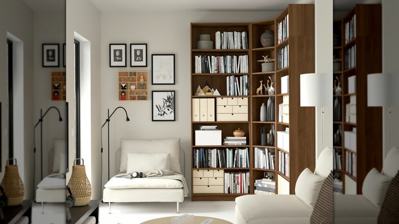 Brown Billy Bookcase with corner shelving in a white, modern living room