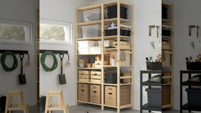 A vertical wooden shelving unit for tools