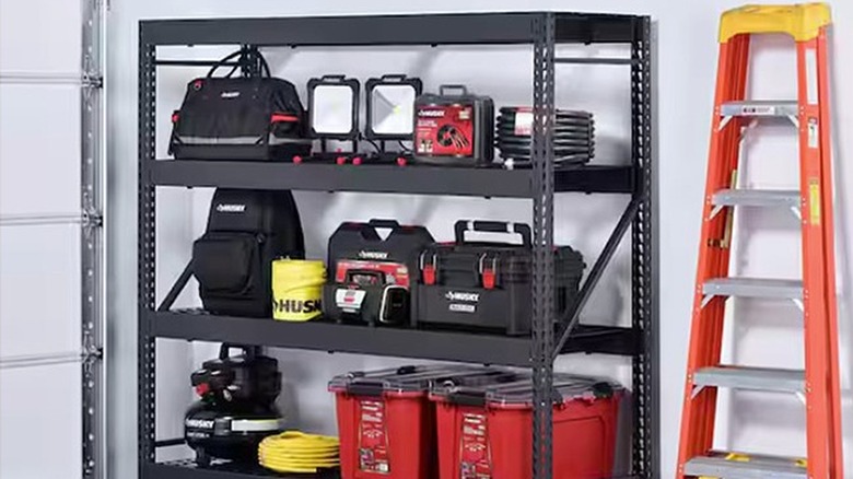 Husky-brand metal shelf standing in a garage