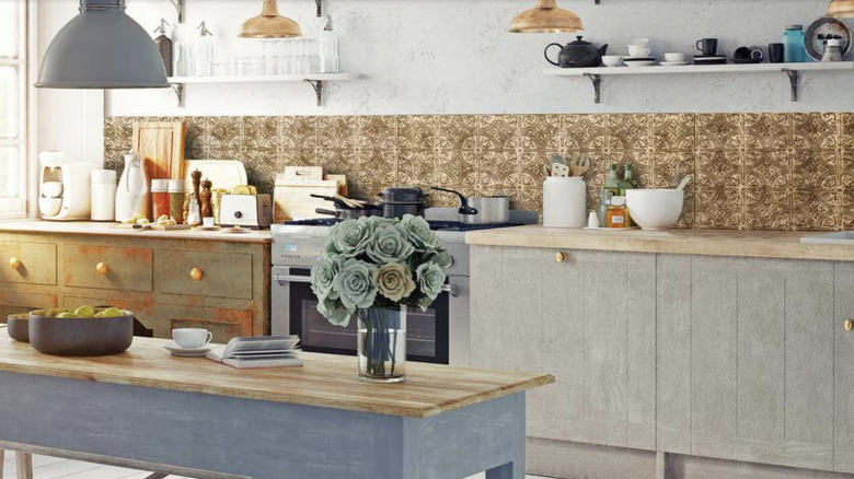 Modern kitchen with bronze-colored PVC backsplash tiles