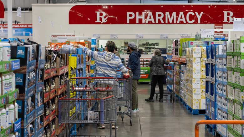 Shoppers buying medicines and supplements at Costco