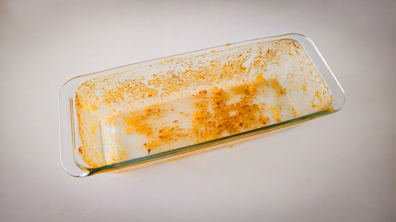 A dirty, stained glass baking dish