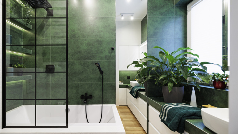 A bathroom with various polished stone surfaces