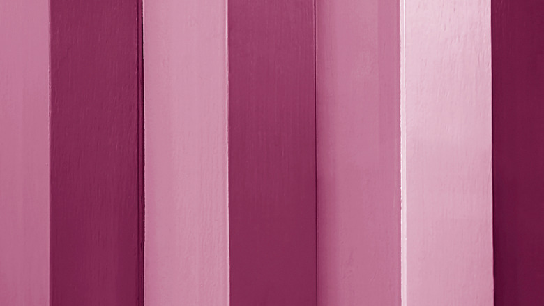 Different dark, medium, and light shades of plum-hued paint