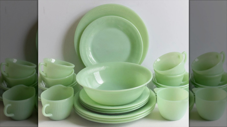 A jadeite Jane Ray dinnerware set including plates and cups