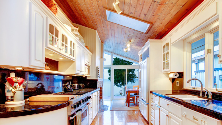 A kitchen with a skylight.