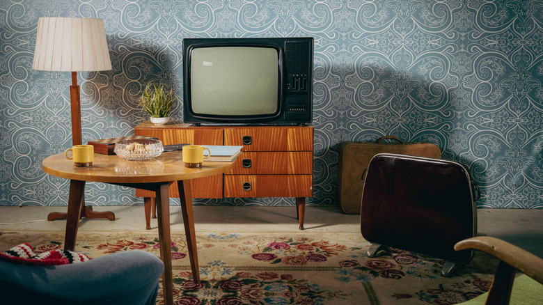 A retro 1980s living room with an old TV
