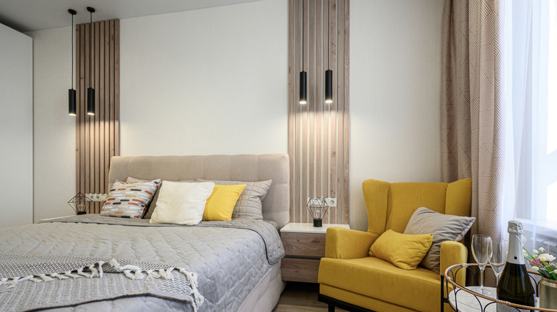 modern bedroom with vertical paneling on wall