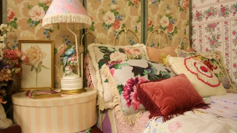 A bedroom full of floral prints