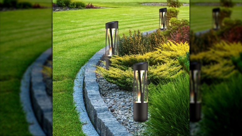 KODA solar-powered lights used in a garden bed