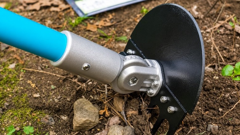 Using the Yard-X tool to cultivate soil