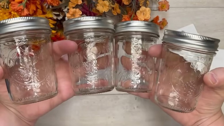 Shopper holding up a Mason jar