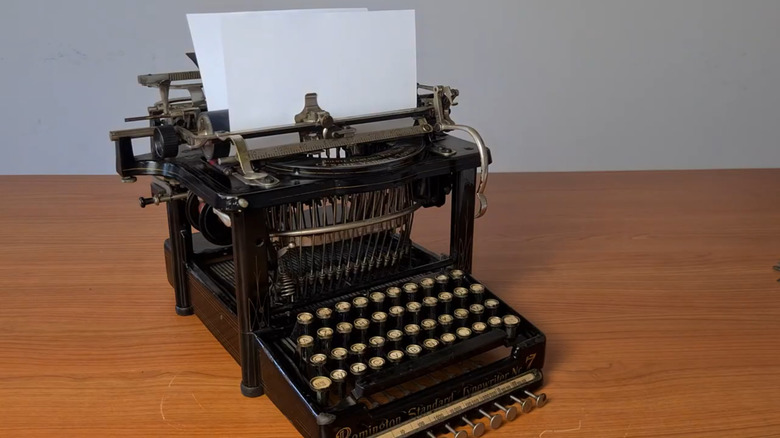 Antique Remington typewriter with paper in the top