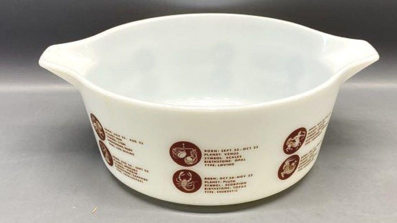 a Pyrex Nemacolin Country Club Promotional Casserole Dish on a gray countertop