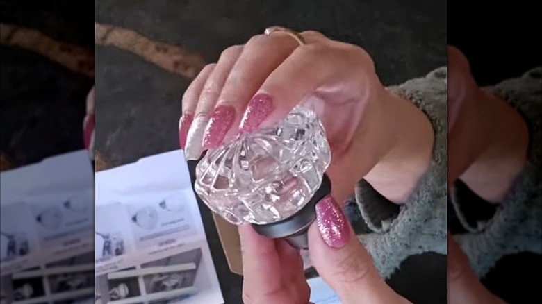 A collection of glass door knobs
