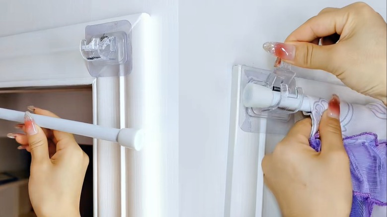 Woman with manicured nails hanging a damage-free adhesive curtain rod over glass door
