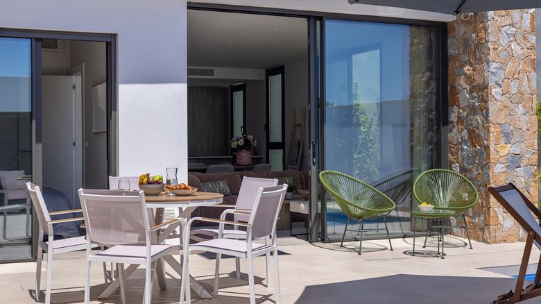 The back view of a house with two sliding glass doors