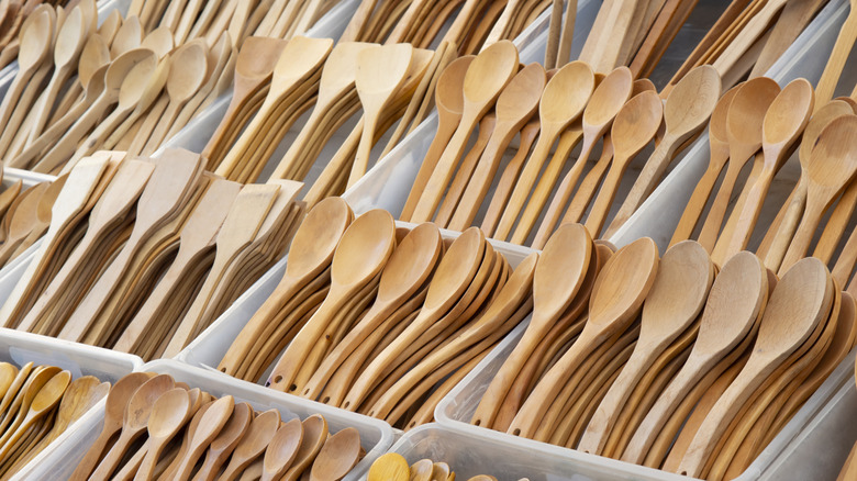A display of wooden spoons for sale.