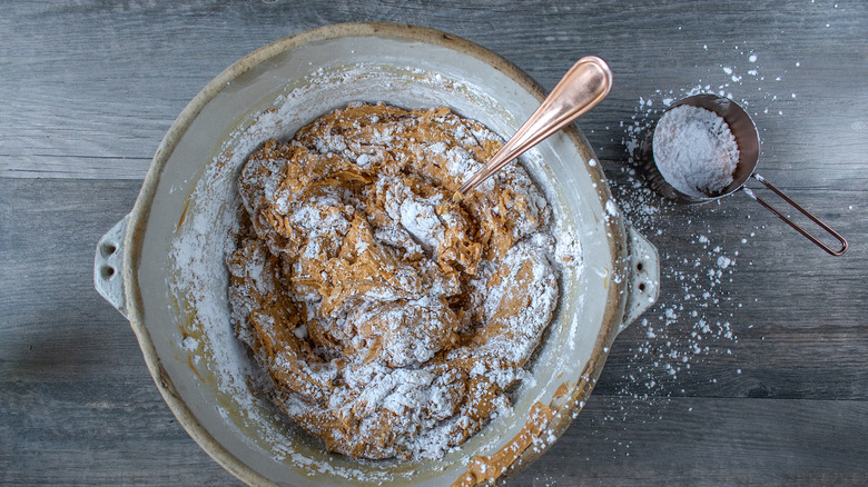 mixing peanut butter and flour