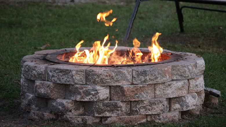 Fire pit made of stacked stone bricks
