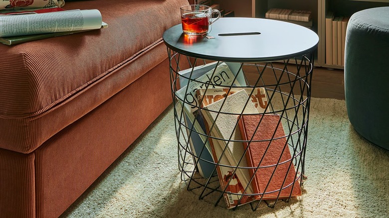 KVISTBRO Storage table in living room full of books