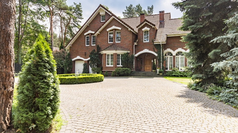 Cobblestone driveway on old English mansion