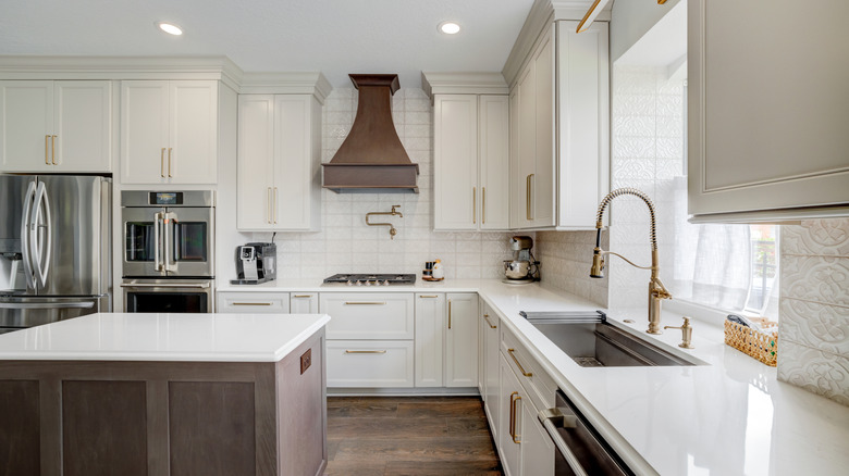 Large renovated kitchen with quartz countertops