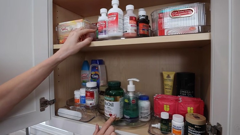 Turntables in cabinets filled with medicine bottles