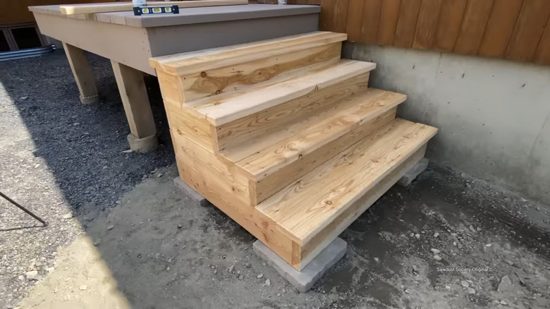 A set of finished wooden box frame steps