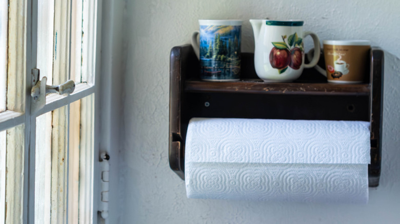Vintage wooden paper holder in a kitchen
