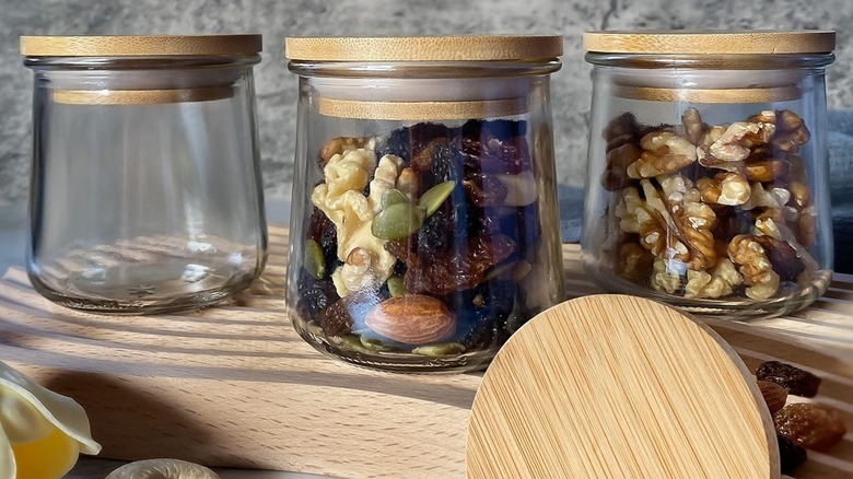 Bamboo lids designed to fit on Oui yogurt jars