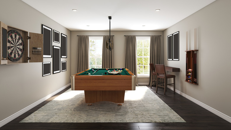 Game room with pool table and dart board