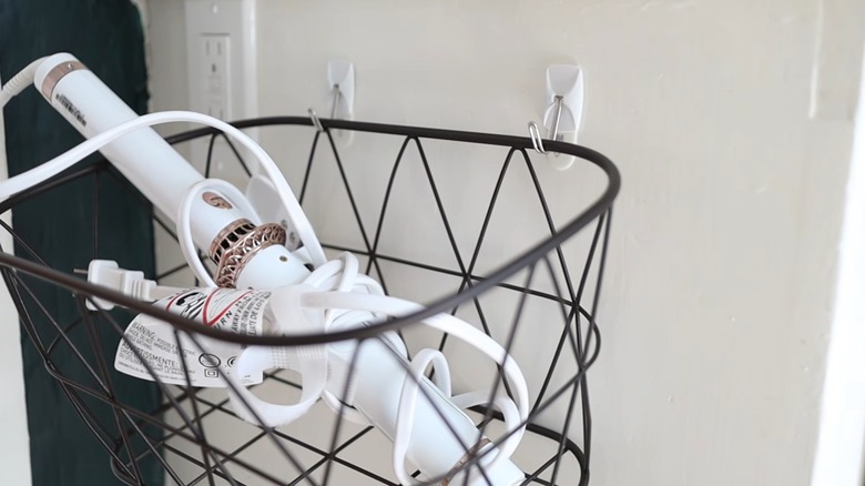 Metal basket hanging on two small Command hooks