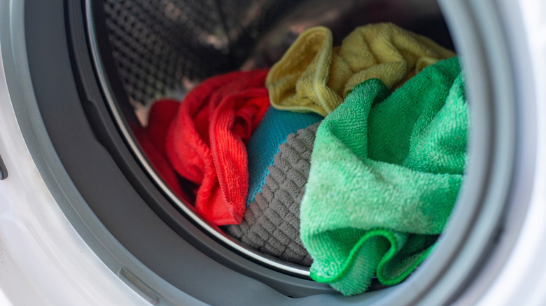 Colorful microfiber towels in a washing machine