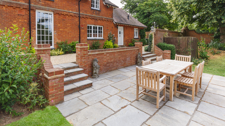 Sandstone paver patio with outdoor furniture
