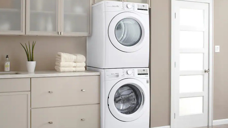An LG DLE3400W clothes dryer showcasing its stackable design