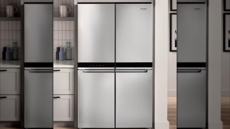 Whirlpool four-door refrigerator in a kitchen with light colors