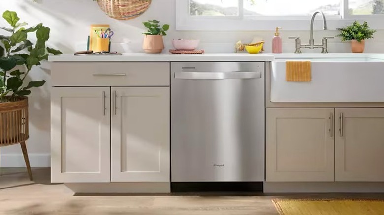 Stainless steel Whirlpool dishwasher in a modern kitchen
