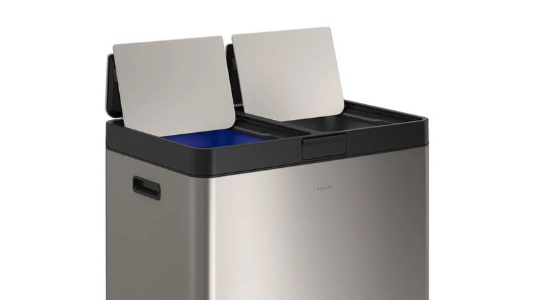 top of stainless steel garbage can with recycling and garbage containers