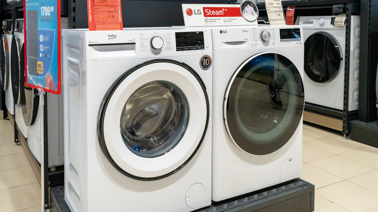 An LG washer and dryer sitting next to each other in a store
