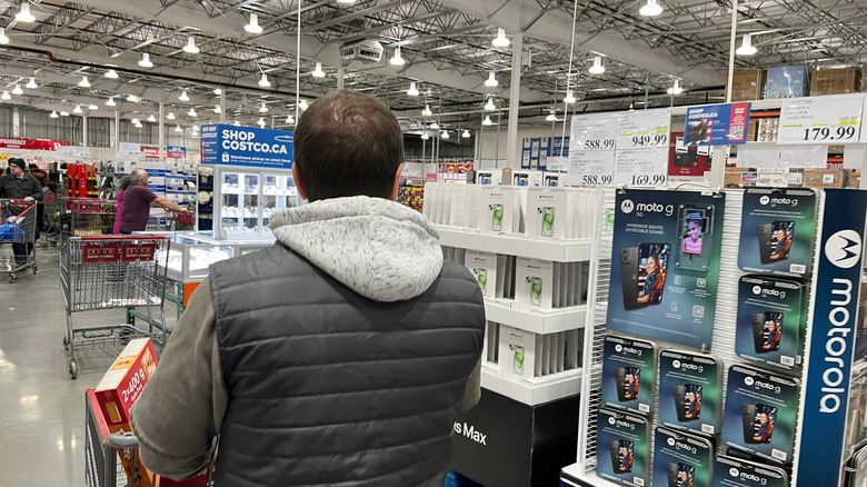 person shopping electronics at Costco