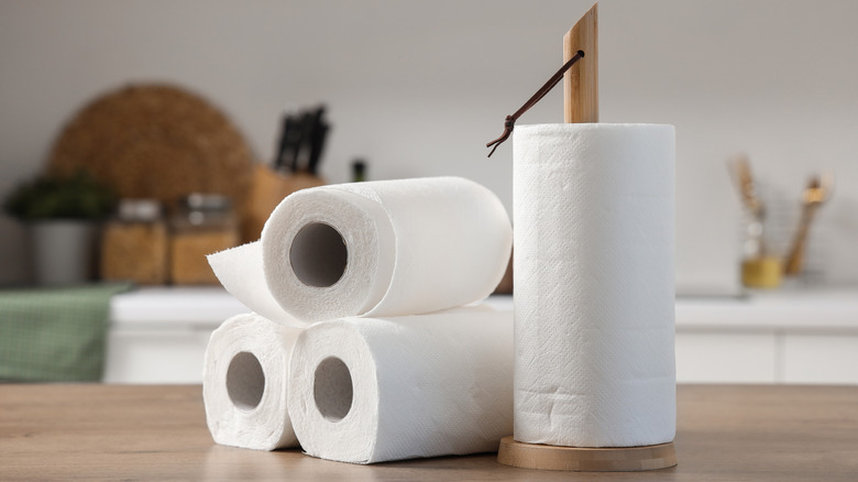 Paper towels on a wooden counter