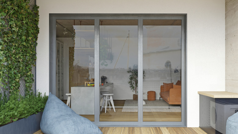 A sliding glass door without curtains