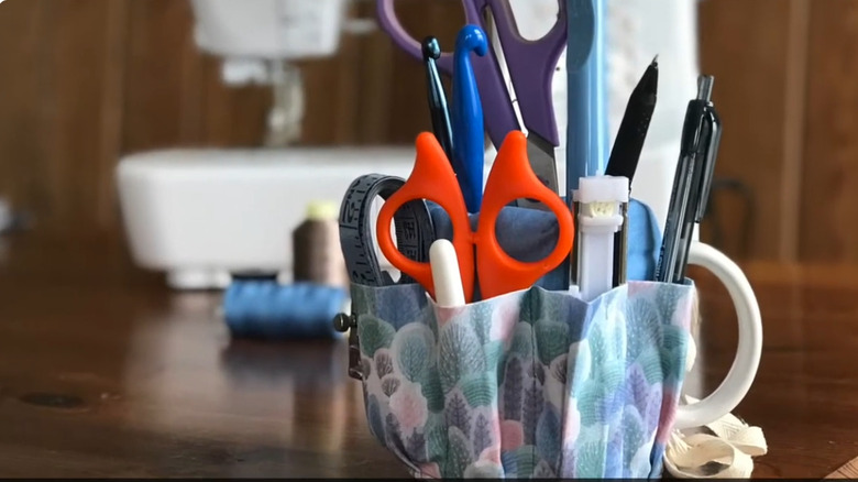Mug caddy to cover old mugs