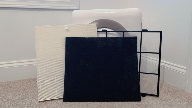 Three filters sit in front of a Coway Airmega Mighty
