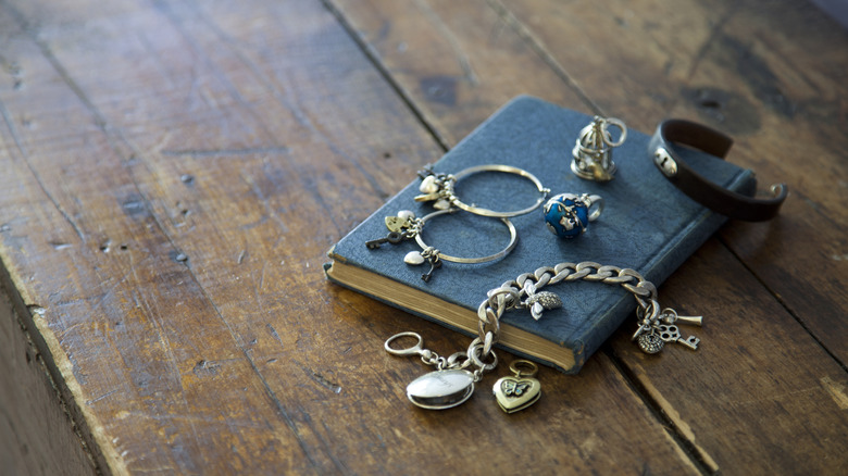 Jewelry sitting on a book