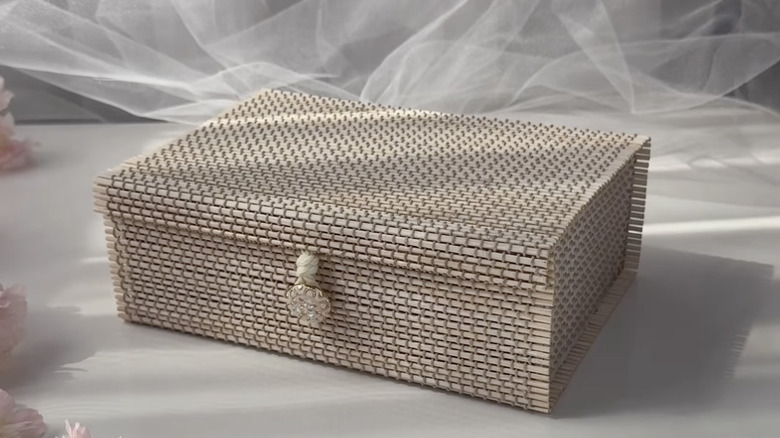 A decorative DIY countertop storage box made from a bamboo mat