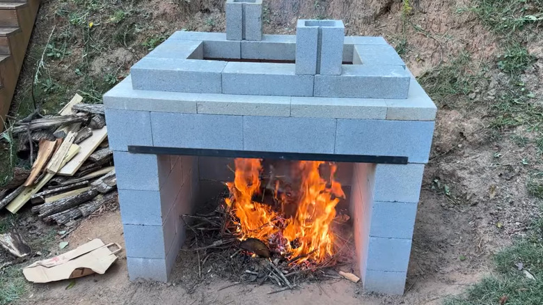 A fire pit made from concrete blocks