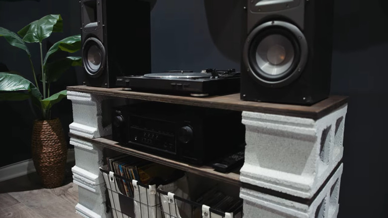 An entertainment stand made on concrete blocks and wood boards
