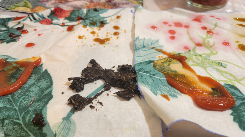 Fabric samples showing different rates of absorption of stain-causing substances